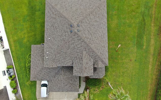 Storm Damage Roof Replacement X